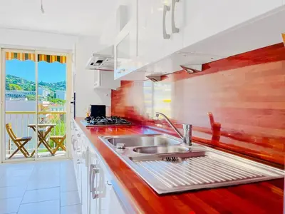 a kitchen with a sink and a counter top at L'Oasis - 3 Pièces centre Cannes in Cannes