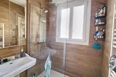 a bathroom with a shower and a sink at HENRI CAMILLE REAL ESTATE- Santiago - 2 bedrooms close Croisette in Cannes
