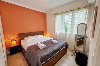a bedroom with a bed with two towels on it at HENRI CAMILLE REAL ESTATE- Santiago - 2 bedrooms close Croisette in Cannes
