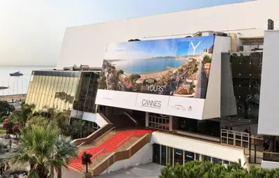 a building with a large billboard on the side of it at PACA Properties 57A - Studio cosy in Cannes