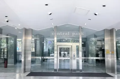 an entrance to a central park building with a revolving door at Studio centre de Cannes in Cannes