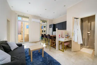 a bathroom with a toilet and a sink at Résidence Raphaël Croisette in Cannes
