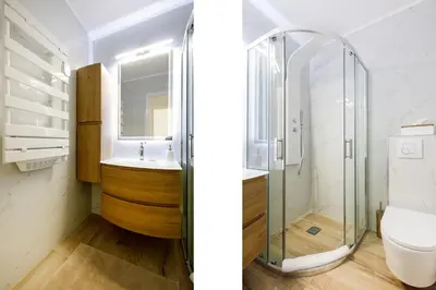 a bathroom with a glass shower and a toilet at Les Liserons YourHostHelper in Cannes