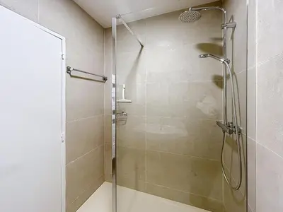 a shower with a glass door in a bathroom at Appartement Canto bright appartement Croisette beach in Cannes