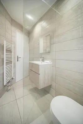 a bathroom with a sink and a toilet at FRGK 