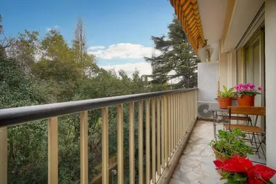 a balcony of a house with flowers on it at FRGK 