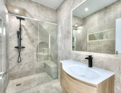 a bathroom with a sink and a shower at Villa Paradis - Cannes in Cannes