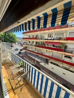 a balcony of a building with chairs on it at Joli Appartement 2 pieces Cannes in Cannes