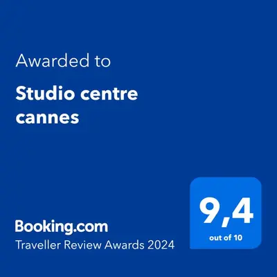 a blue screen with the text awarded to studio centre games at Confortable studio Cannes centre in Cannes