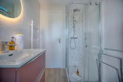 a bathroom with a shower and a sink at IMMOGROOM - 5 min from the Croisette beaches - Terrace - Ac - Sea view in Cannes