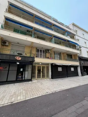 a large building with a balcony on top of it at Viva Riviera Brand New Top Floor close Croisette in Cannes