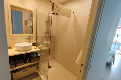a bathroom with a shower and a sink at WE CANNES ! Exceptional 4 rooms apartment Cannes Center swimming pool in Cannes