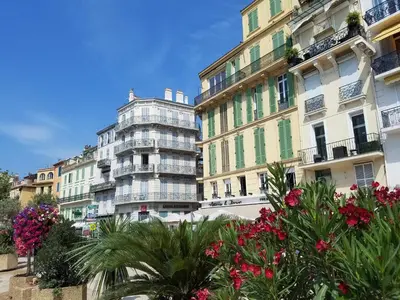 a group of buildings with flowers in front of them at Citilet Louis Blanc 1,2,3 - Three gorgeous, open-plan apartments in Cannes