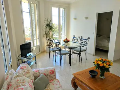 a living room with a couch and a table at Citilet Louis Blanc 1,2,3 - Three gorgeous, open-plan apartments in Cannes