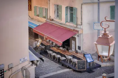 an overhead view of a restaurant with tables and chairs at IMMOGROOM - Heart of the Suquet - City center - Modern in Cannes