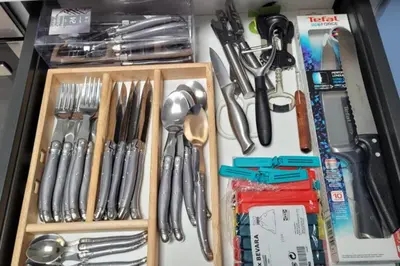 a drawer filled with lots of utensils at 06DI Cannes Hoche in Cannes