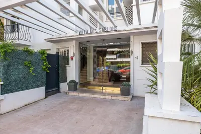 a entrance to a house with a glass door at Penthouse Duplex with Rooftop Terrace in Cannes