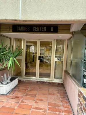 a building with a sign that reads games center at Cannes proche Croisette et palais magnifique appartement 4 couchages in Cannes