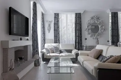 a dining room with a table and chairs at Duplex Saint-henry by Halldis in Cannes