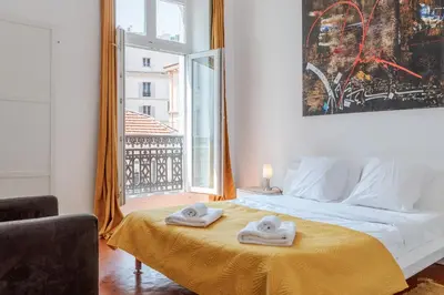 a bedroom with a bed with two towels on it at BARBARA by Terry's Homes in Cannes