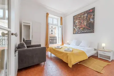 a living room with a bed and a couch and a couch at BARBARA by Terry's Homes in Cannes