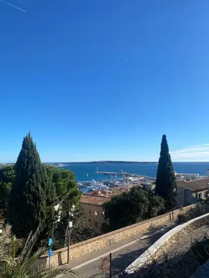 a view from the top of a hill with trees at Agréable T2 rénové, Cannes centre, Suquet, plages in Cannes