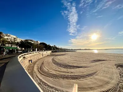 a sand sculpture on a beach near the water at Elegant studio proche Palais des Festivals in Cannes