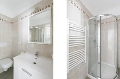 a bathroom with a shower and a sink and a toilet at Elegant studio proche Palais des Festivals in Cannes