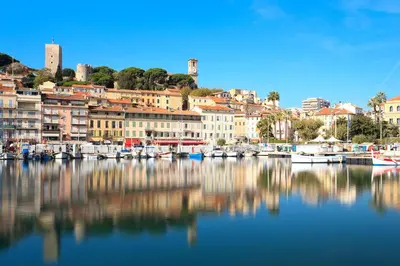 a group of boats are docked in a harbor at 2p Cannes centre-ville Terrasse in Cannes