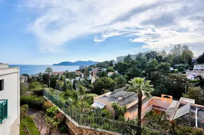 a view of a city from a building at Résidence Cannes Villa Francia - maeva Home - Appartement vue mer 3 pièces 6 personnes - Prestige MAE-9674 in Cannes
