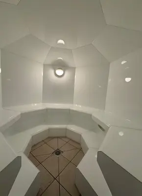 a white room with a ceiling with a light at Appartement front de mer, 80M2 (3P), Piscine & Mer in Cannes