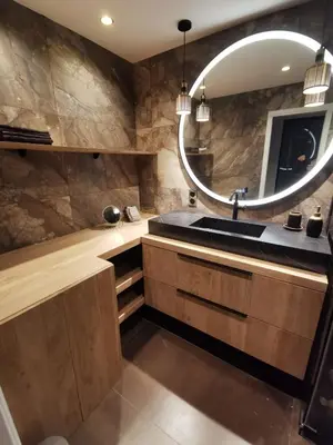 a bathroom with a sink and a mirror at 2 bedrooms seafront in Cannes