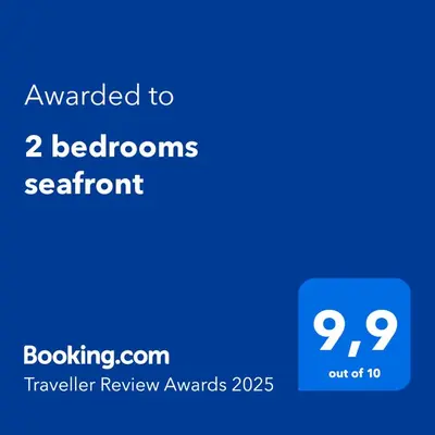 a blue text box with the words awarded to browns sedgmentspoon at 2 bedrooms seafront in Cannes