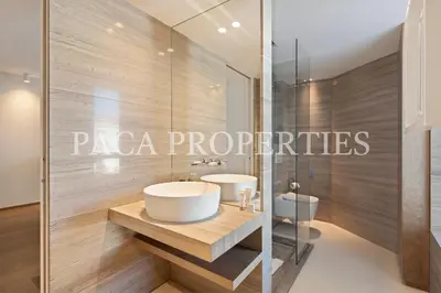 a bathroom with two sinks and a shower at Paca Properties -401- 5 Chambres Luxe in Cannes