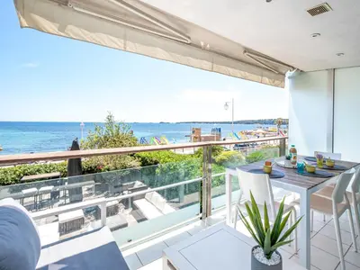 a view of the ocean from the balcony of a house at Apartment Cannes Bay-3 by Interhome in Cannes