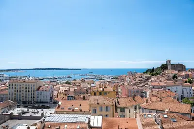 an aerial view of a city with buildings at LE SINATRA splendide vue mer panoramique et balcon, idéal pour des séjours de loisirs ou business in Cannes