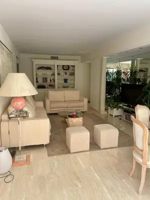 a living room with a couch and a table and chairs at Luxus Wohnung nahe Croisette in Cannes