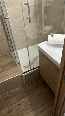 a bathroom with a shower and a sink and a toilet at Studio cosy près de la Croisette in Cannes