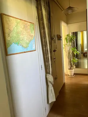 a map on the door of a hallway at Rez de Jardin Paisible avec Parking - Entrée des Artistes in Cannes