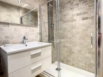 a bathroom with a sink and a shower at 1 bedroom rue d'Antibes , 1 min from the Croisette, 5 mins from the Palais 202 in Cannes