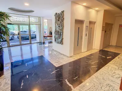 a lobby with a marble floor and a building at 1 bedroom Velasquez, 5 mins from Croisette 244 Cannes Riviera in Cannes