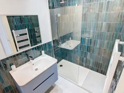 a bathroom with a sink and a shower at 1 bedroom Velasquez, 5 mins from Croisette 244 Cannes Riviera in Cannes