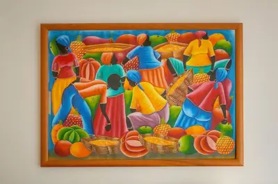 a painting of women with fruit on a wall at FRGK 