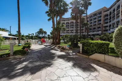 a walkway in front of a building at Résidence Cannes Verrerie - maeva Home - Appartement climatisé 3 pièces 4 personnes - Budget MAE-6894 in Cannes