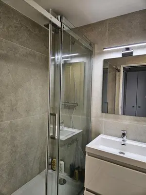 a bathroom with a shower and a sink at Résidence Cannes Verrerie - maeva Home - Appartement climatisé 3 pièces 4 personnes - Budget MAE-6894 in Cannes