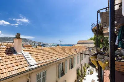 a view of the roofs of buildings at LE CHARMANT sublime Maison de Ville dans le Suquet au calme in Cannes