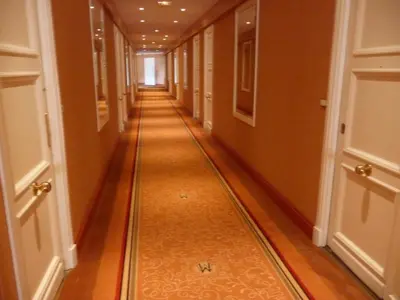 an empty hallway with a long hallway floor at Cannes, Croisette, Palais Miramar in Cannes
