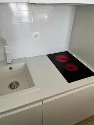 a white counter top with a sink in a kitchen at Cannes, Croisette, Palais Miramar in Cannes