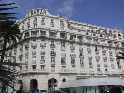 a large white building with a lot of windows at Cannes, Croisette, Palais Miramar in Cannes