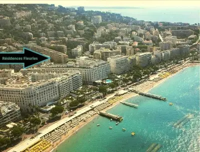 an aerial view of a beach and buildings at Ref FLEUR - Palmes d'Or Properties in Cannes